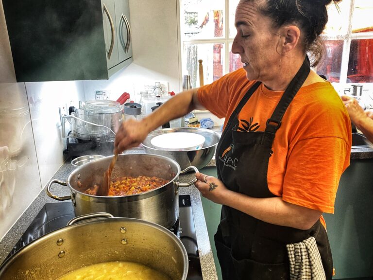 WAC volunteer cooking